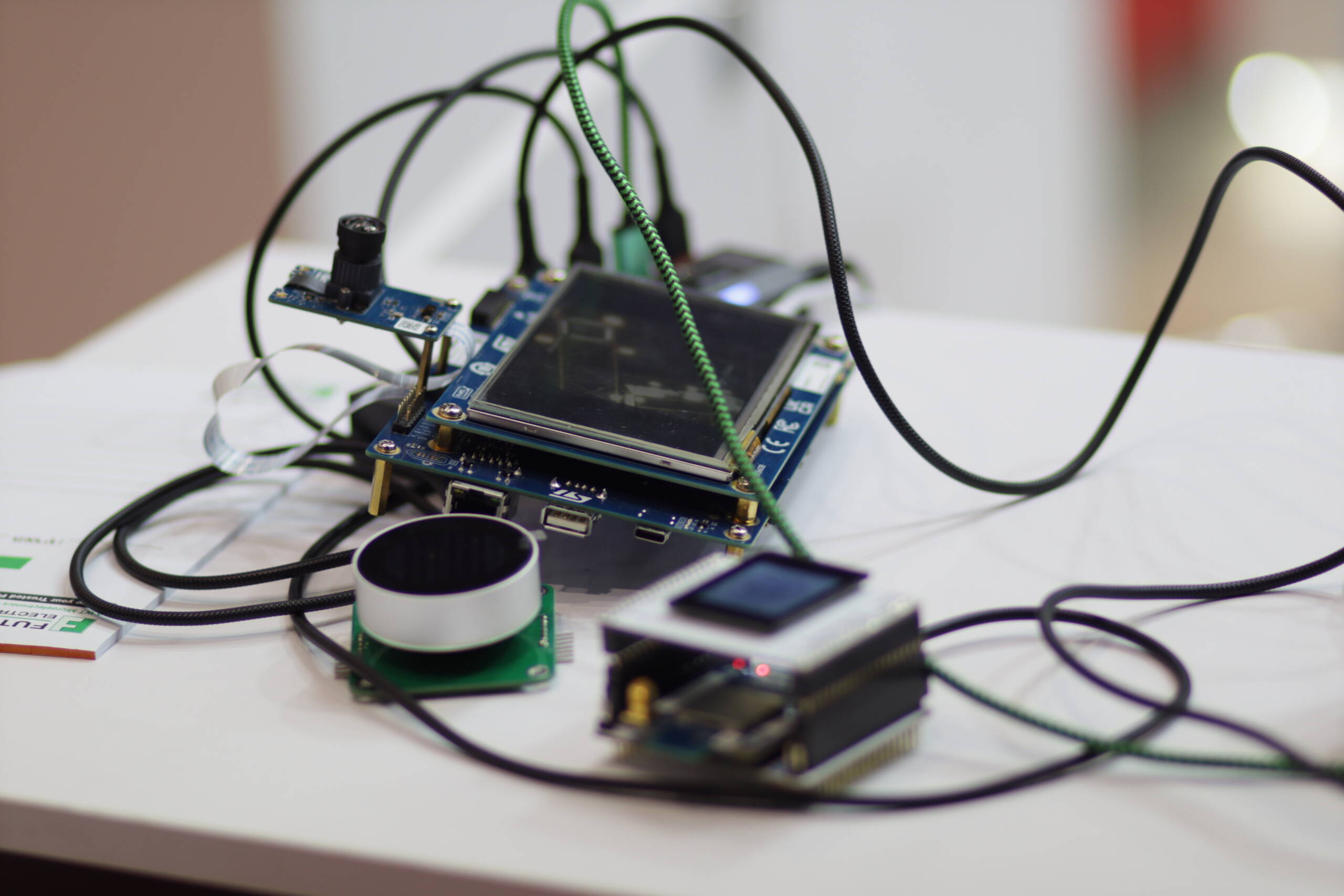 Machine vision development hardware with camera module, ultrasonic sensor, and embedded display boards